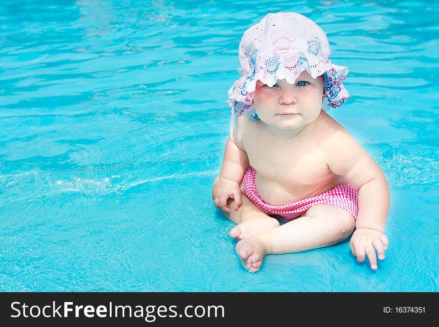 Cute little girl in waterpool