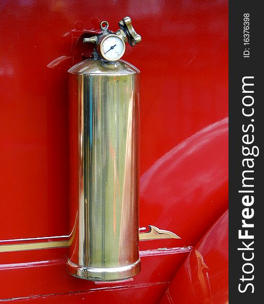 Old bronze fire extinguisher vintage