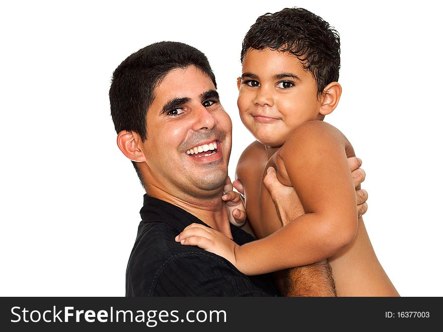 A happy young latin father carrying his son on a white background. A happy young latin father carrying his son on a white background