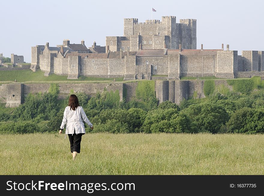 Woman visiting english castle placed in dover uk europe. Woman visiting english castle placed in dover uk europe