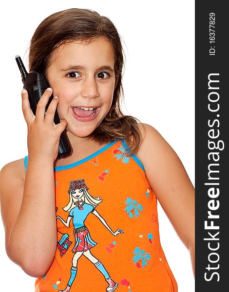 Beautiful girl with a happy expression talking on the phone on a white background. Beautiful girl with a happy expression talking on the phone on a white background