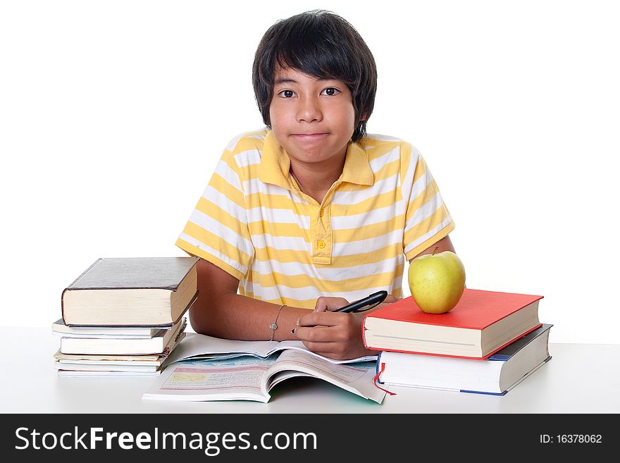 Learn for school, young student make his homework against white background