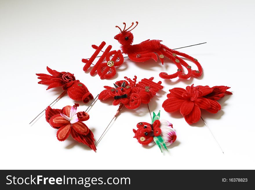 Traditional Chinese hair ornaments in shape of phoenix, golden fish, flowers, etc.
