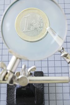 Euro Coin Under Magnifier Stock Photography