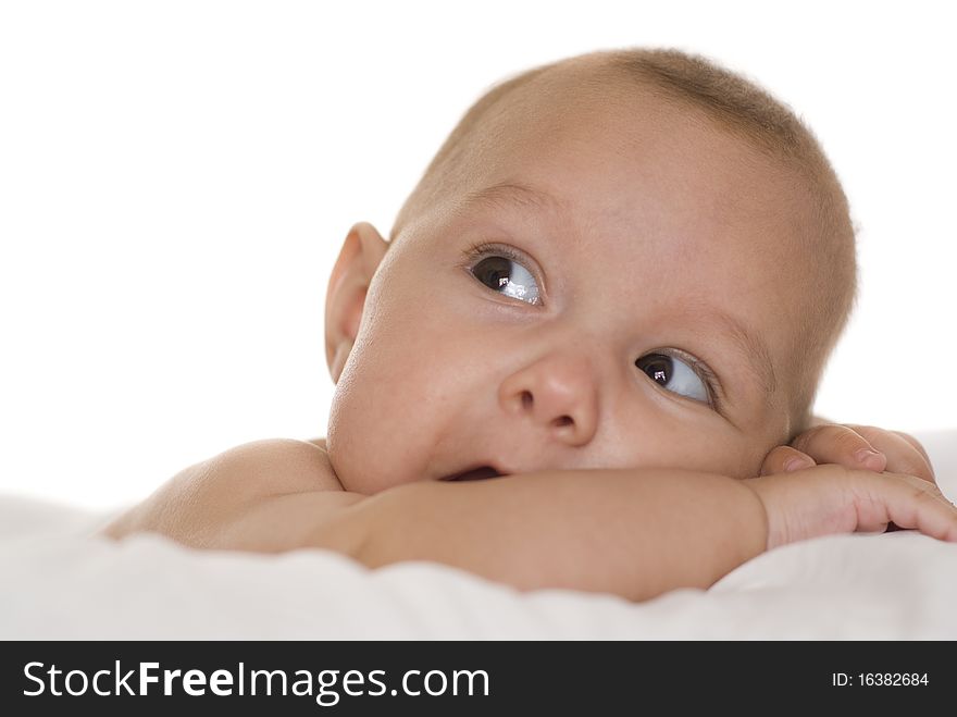 Portrait of a beautiful newborn on a white