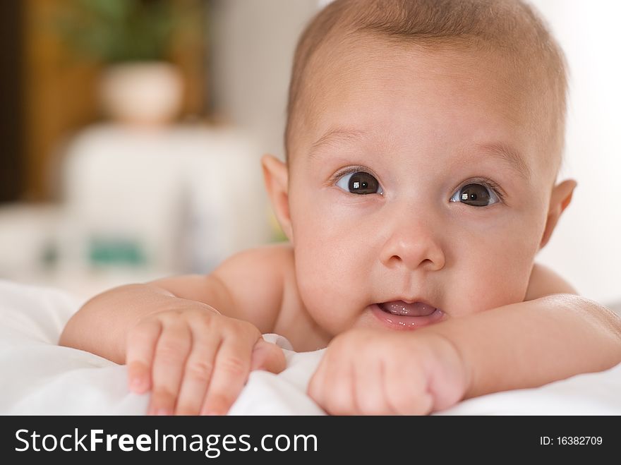 Portrait of a beautiful baby on a white