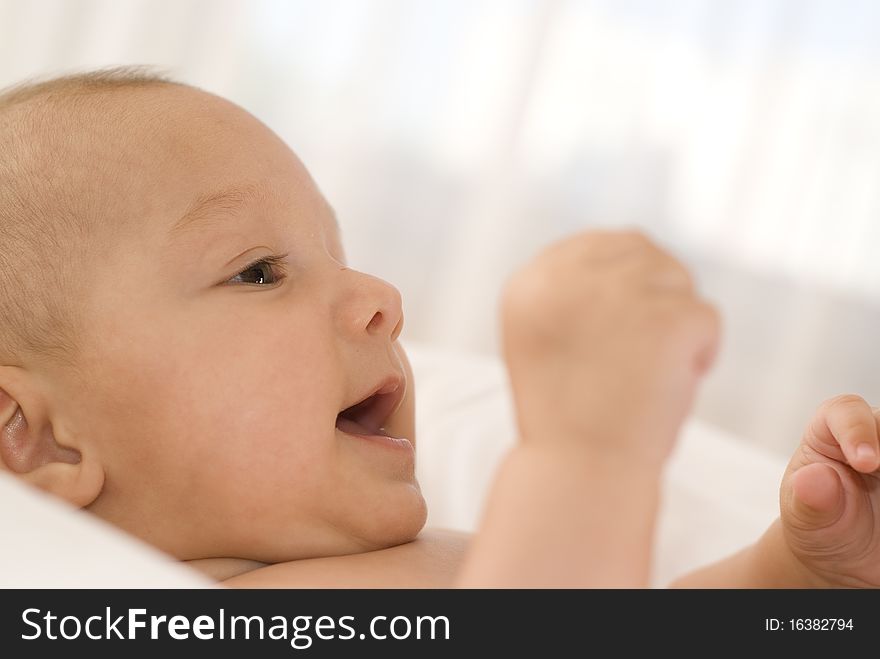 Portrait of a beautiful newborn on a white