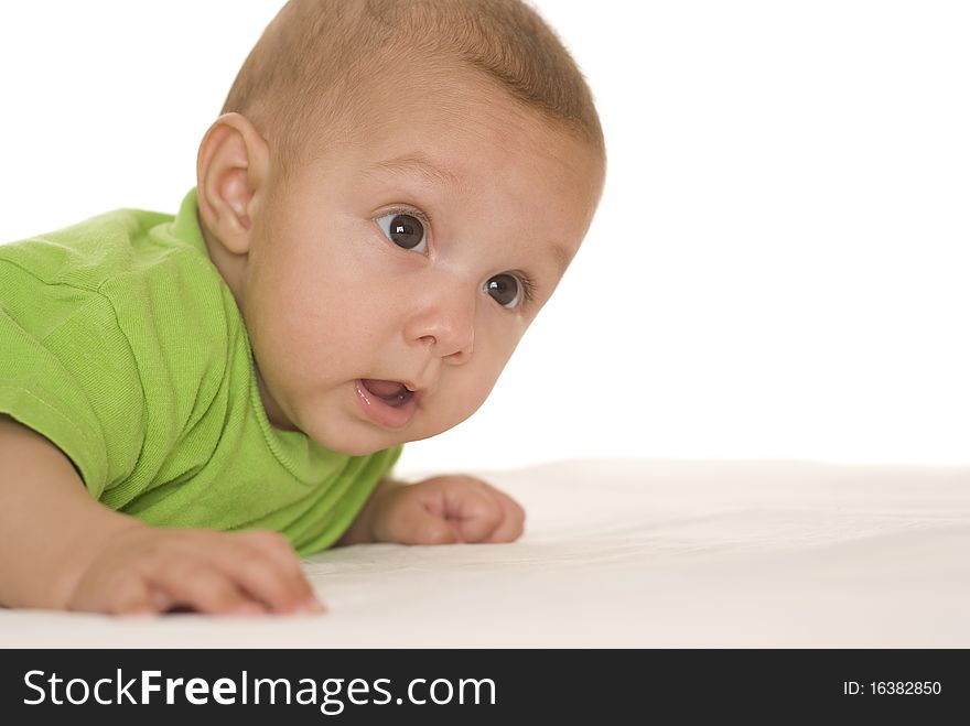 Portrait of a beautiful newborn in green