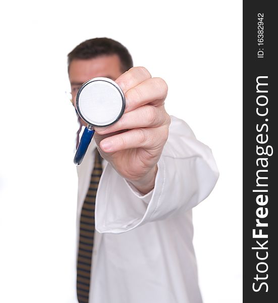 Doctor isolated on white. Points stethoscope close to camera. Focus on end of stethoscope. Doctor isolated on white. Points stethoscope close to camera. Focus on end of stethoscope.