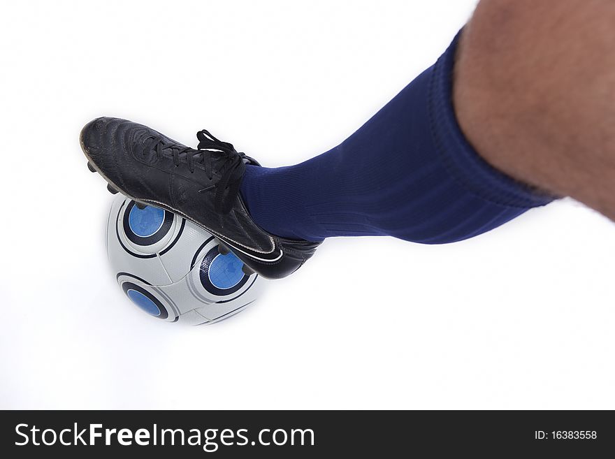 Young soccer player in action, isolated on white