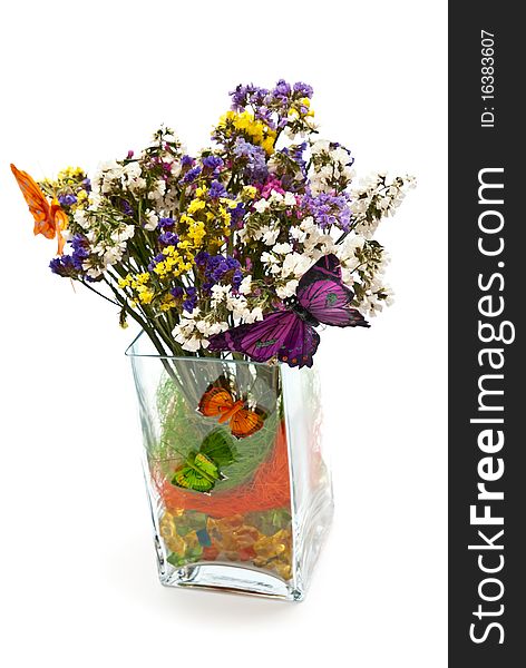 Flowers in glass vase with butterflies. Isolated on white. Flowers in glass vase with butterflies. Isolated on white