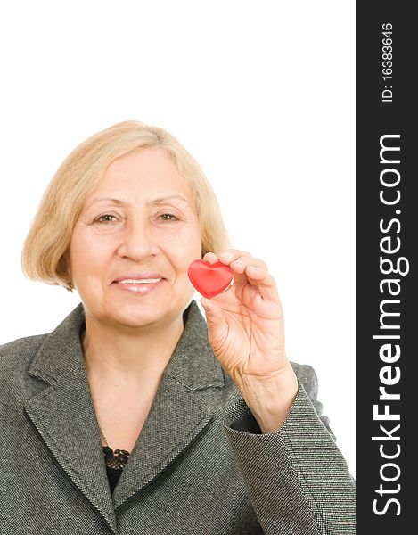 Senior woman holding red Heart isolated on white background. Senior woman holding red Heart isolated on white background