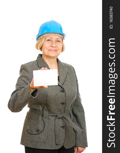 Senior woman with blue hard hat holding a blank card isolated on white background