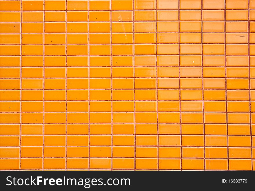 Ceramic orange on wall texture. Ceramic orange on wall texture