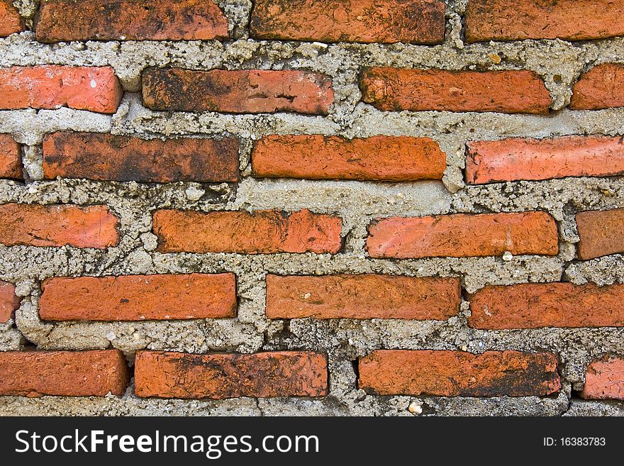 The old brick wall in Thai temple.