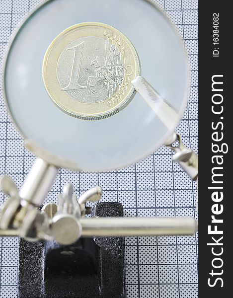 Euro Coin Under Magnifier