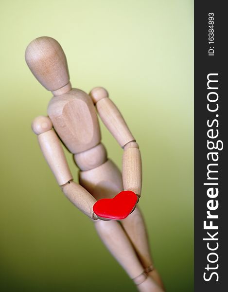 Stick figure offering his heart. Stick figure offering his heart.