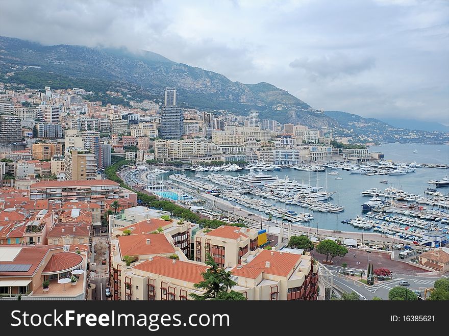 Monaco, view of Port Hercule and Monte-Carlo. Monaco, view of Port Hercule and Monte-Carlo.