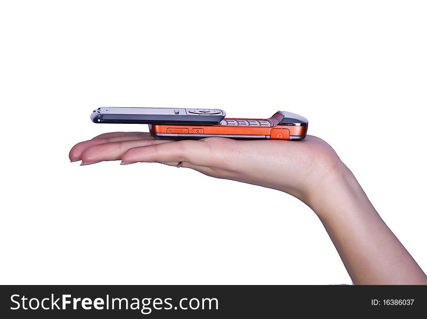 Thin slider cell phone laying on hand on a white background. Thin slider cell phone laying on hand on a white background