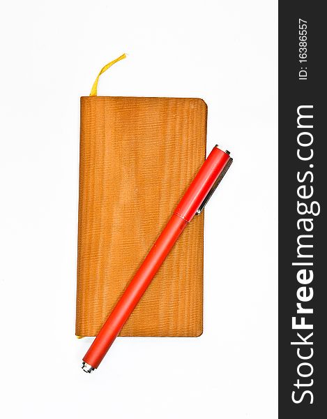 Diary book with a red pen