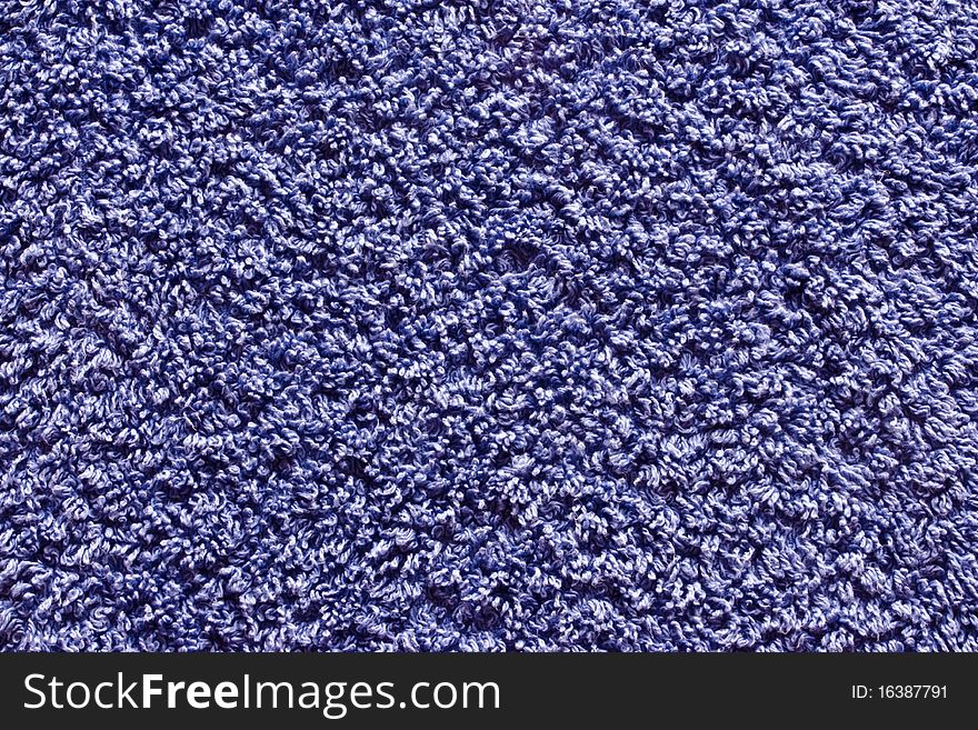 A background picture of a blue towel. A background picture of a blue towel