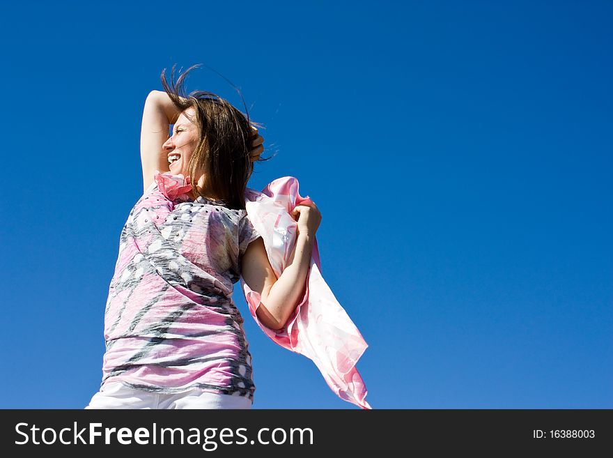 Positive young girl against the sky in summer. Positive young girl against the sky in summer