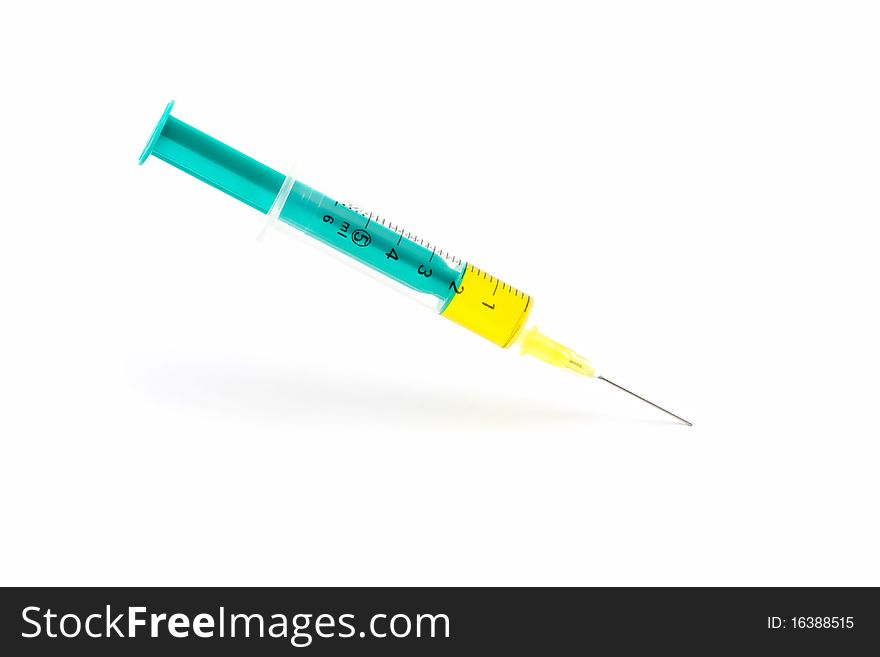 Isolated hypodermic syringe on white