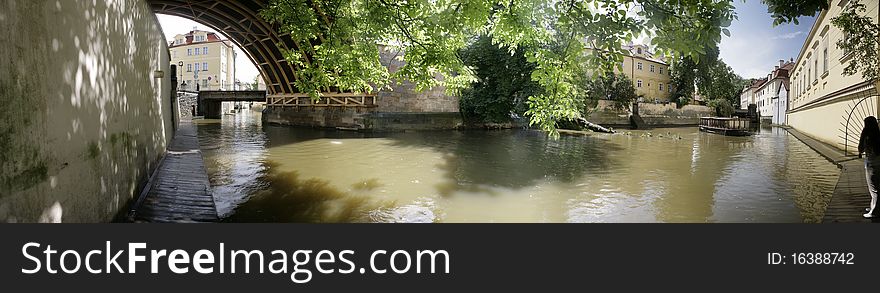 Narrow channels in Prague and old houses. Prague panoram