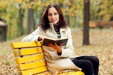 Young Woman Sitting On Bench In Autumn Park Royalty Free Stock Photo Young Woman Sitting On Bench In Autumn Park Royalty Free Stock Photo