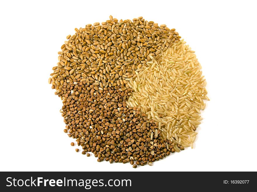 The grains of rice combined together, wheat and buckwheats. The grains of rice combined together, wheat and buckwheats