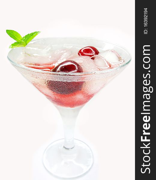 Alcohol liqueur cocktail with cherry