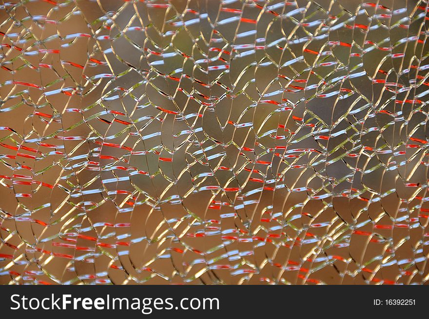 Colored Reflections of Cracks in Broken Glass. Colored Reflections of Cracks in Broken Glass