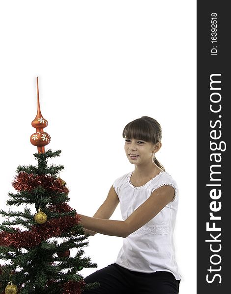 Girl decorate a New Year tree, isolated