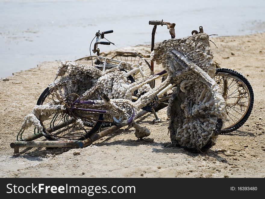 Salted bicycles abandoned at the bank of Dead Sea. Salted bicycles abandoned at the bank of Dead Sea