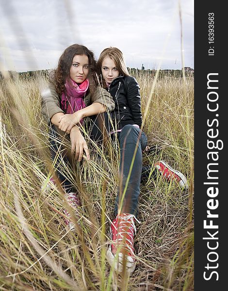 Autumn portrait of two young women