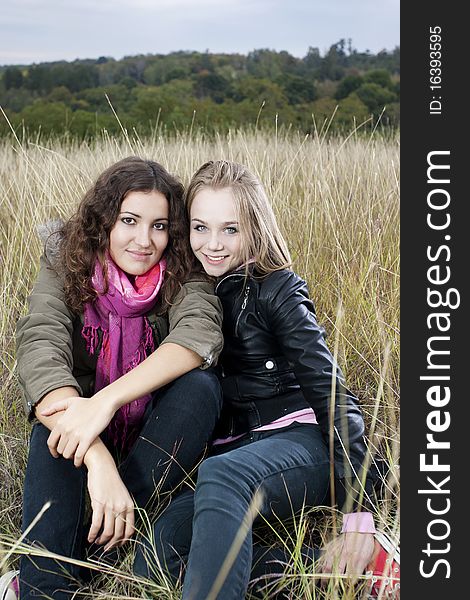 Autumn portrait of two young women