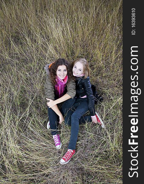 Twobeautiful young women on a beautiful autumn day. Twobeautiful young women on a beautiful autumn day