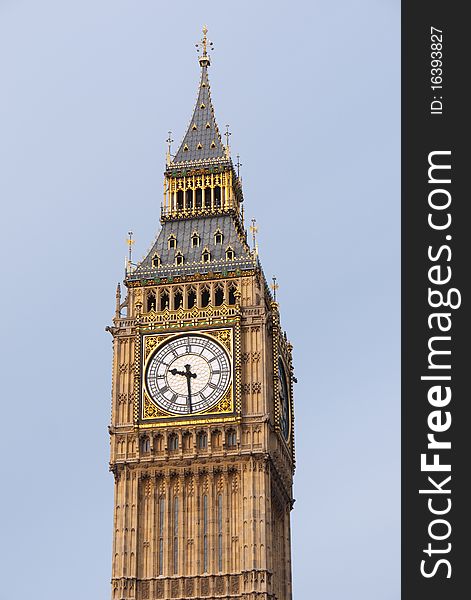 A close up of the Gothic Clock Face of Big Ben showing the gilded decorations reflecting in the sunlight. Houses of Parliament, London UK. A close up of the Gothic Clock Face of Big Ben showing the gilded decorations reflecting in the sunlight. Houses of Parliament, London UK.