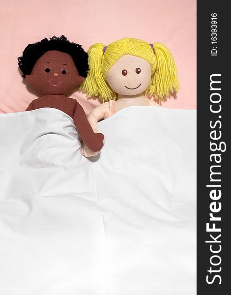Interracial couple concept , with handmade rag dolls