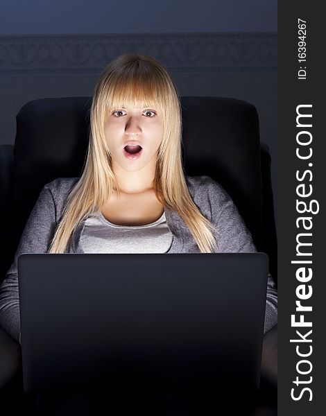 Shocked Blonde Woman with Grey Laptop. Shocked Blonde Woman with Grey Laptop