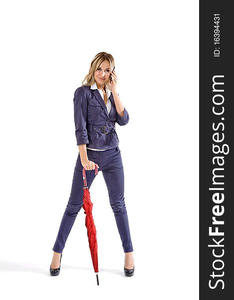 Young businesswoman with red umbrella. Young businesswoman with red umbrella