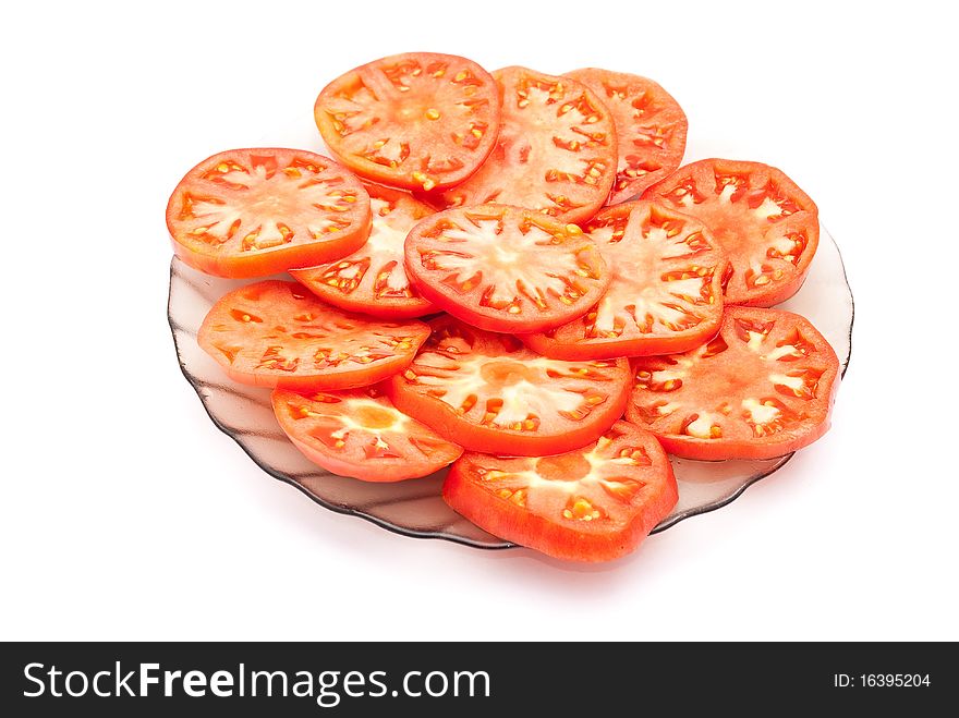 Sliced tomatoes on white background