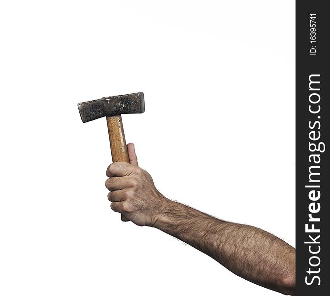 Hand holding a medium hammer on a white set. Hand holding a medium hammer on a white set