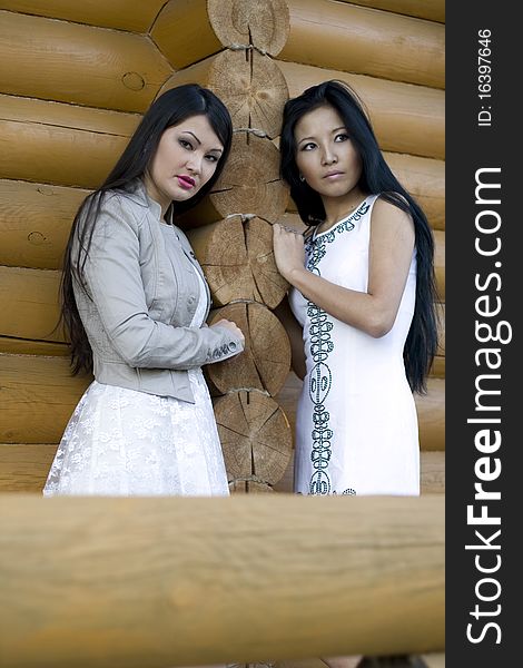 Two female friends walking outdoor