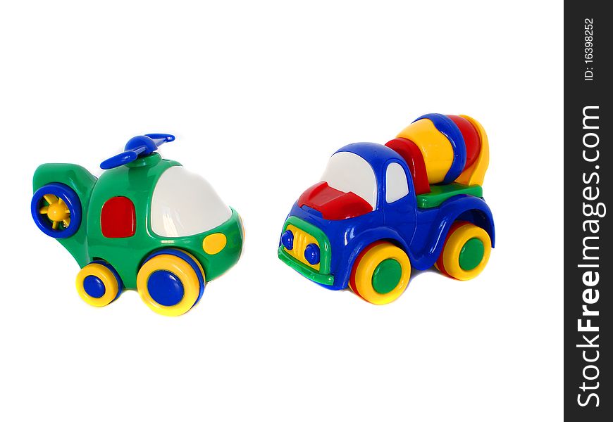 Multicoloured toy car and  helicopter on white. Multicoloured toy car and  helicopter on white
