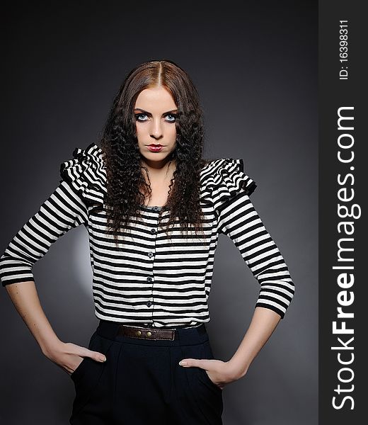 Beautiful fashion woman in stripy top with creative make-up. Beautiful fashion woman in stripy top with creative make-up