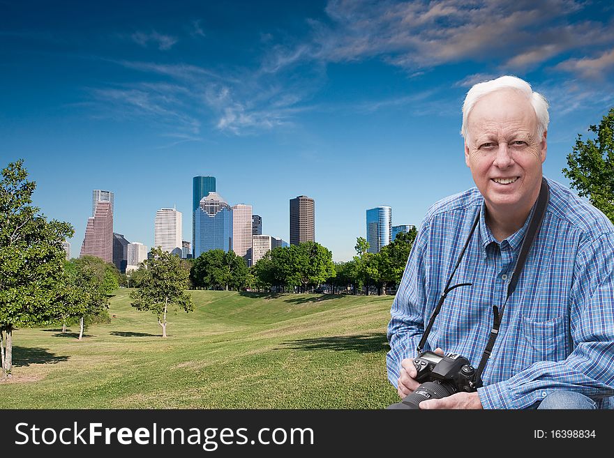 Portrait of photographer with city in background. Portrait of photographer with city in background.