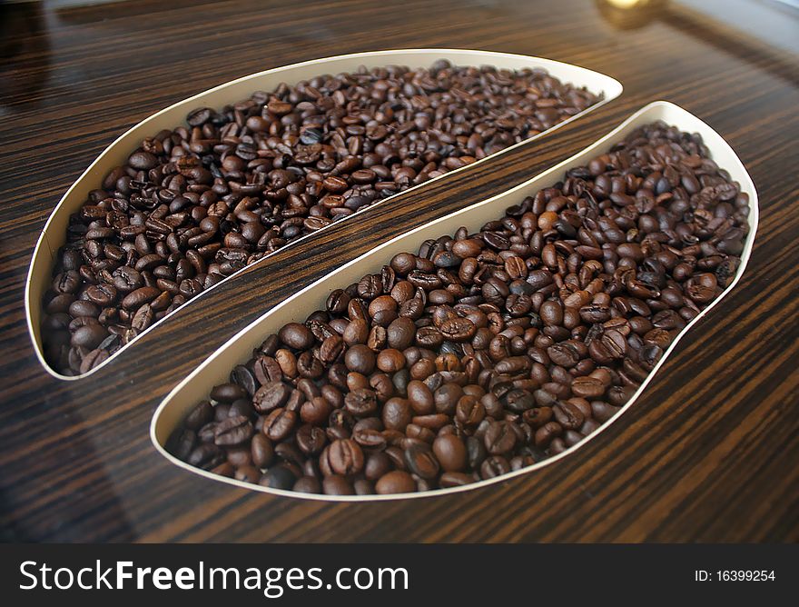 Coffee Beans in original coffee been shape table