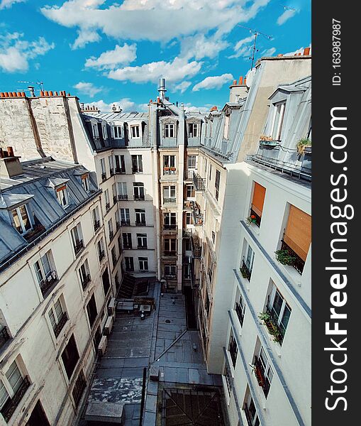 Above view of the parisian buildings and the it& x27;s center court, typical architecture of Paris, France