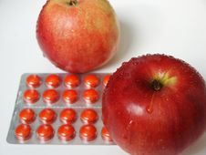 Two Red Apples And Tablets Royalty Free Stock Image Two Red Apples And Tablets Royalty Free Stock Image